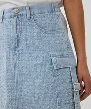Load image into Gallery viewer, The EsQualo Distressed Jeans Skirt is a stylish denim skirt featuring a distressed design with cargo-style pockets and chic buckle details. It also has a unique button with inlaid rhinestones, adding a touch of elegance to its rugged charm. This versatile piece is perfect for casual outings or adding a trendy edge to your wardrobe.