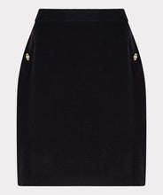 Load image into Gallery viewer, Elevate your style with our Knitted Short Skirt. This versatile piece features a cozy knitted texture and includes shiny gold buttons, making it perfect for both casual and dressy occasions. The skirt's short length and snug fit accentuate your silhouette, while the elastic waistband provides comfort and ease of movement. Pair it with a tucked-in blouse or a cozy sweater for a chic, effortlessly stylish look.