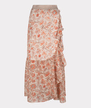 Load image into Gallery viewer, A beautiful skirt that easily transitions from the warmer to cooler months, our Taylin offers a beautiful abstract floral print in orange, brown and red against a pale peach background. Gold threading throughout and a shiny gold elastic waist band adds elegant features. The Taylin has the look of a wrap skirt but is connected for easy wear, with a ruffle running down one side of the split skirt in the front. Fully lined in beige color to the knee with a transparent look at the bottom.