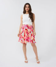 Load image into Gallery viewer, Asymmetric skirt with descending flounce in the beautiful print called "Heat Wave." Besides being super stylish, this skirt is also super comfortable due to the stretchy waistband. Style with your favorite white top and sandals for the perfect summer outfit.