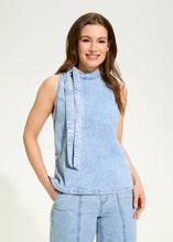 Load image into Gallery viewer, Timelessly chic, this powder wash blue sleeveless blouse features a flattering bow-tie neck, perfect for adding sophistication to any outfit. Whether you're dressing up for a day at the office or a night out, this elegant piece offers effortless style.