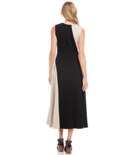 Load image into Gallery viewer, This fabulous dress is meant to be in your spring/summer wardrobe! Contrasting panels give this figure-flattering dress an edgy, modern look. It also features a trend-right midi length. Colors- Beige and black. Sleeveless. Colorblock. Center back invisible zipper. Midi length.