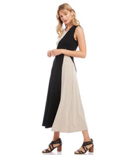 Load image into Gallery viewer, This fabulous dress is meant to be in your spring/summer wardrobe! Contrasting panels give this figure-flattering dress an edgy, modern look. It also features a trend-right midi length. Colors- Beige and black. Sleeveless. Colorblock. Center back invisible zipper. Midi length.