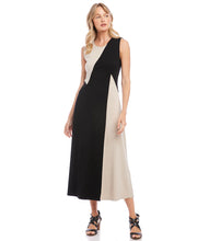 Load image into Gallery viewer, This fabulous dress is meant to be in your spring/summer wardrobe! Contrasting panels give this figure-flattering dress an edgy, modern look. It also features a trend-right midi length. Colors- Beige and black. Sleeveless. Colorblock. Center back invisible zipper. Midi length.