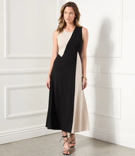 Load image into Gallery viewer, This fabulous dress is meant to be in your spring/summer wardrobe! Contrasting panels give this figure-flattering dress an edgy, modern look. It also features a trend-right midi length. Colors- Beige and black. Sleeveless. Colorblock. Center back invisible zipper. Midi length.