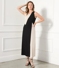 Load image into Gallery viewer, This fabulous dress is meant to be in your spring/summer wardrobe! Contrasting panels give this figure-flattering dress an edgy, modern look. It also features a trend-right midi length. Colors- Beige and black. Sleeveless. Colorblock. Center back invisible zipper. Midi length.