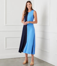 Load image into Gallery viewer, The Karen Kane Sleeveless Colorblock Midi Dress is a bold and modern piece designed to flatter the figure. Featuring dynamically contrasting navy and blue panels, this dress creates a striking visual effect while maintaining a timeless elegance. Perfect for both casual and dressy occasions, this figure flattering dress effortlessly styles with heels or sandals for a chic ensemble.