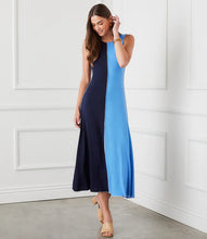 Load image into Gallery viewer, The Karen Kane Sleeveless Colorblock Midi Dress is a bold and modern piece designed to flatter the figure. Featuring dynamically contrasting navy and blue panels, this dress creates a striking visual effect while maintaining a timeless elegance. Perfect for both casual and dressy occasions, this figure flattering dress effortlessly styles with heels or sandals for a chic ensemble.