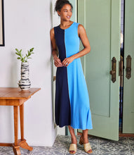 Load image into Gallery viewer, he Karen Kane Sleeveless Colorblock Midi Dress is a bold and modern piece designed to flatter the figure. Featuring dynamically contrasting navy and blue panels, this dress creates a striking visual effect while maintaining a timeless elegance. Perfect for both casual and dressy occasions, this figure flattering dress effortlessly styles with heels or sandals for a chic ensemble.