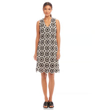 Load image into Gallery viewer, Turn heads in the Karen Kane Sleeveless Crochet Shift Dress, where timeless sophistication meets modern charm. Featuring a flattering shift silhouette, this dress boasts delicate woven crochet circles for a unique texture and visual appeal. The scalloped hem adds a graceful touch, perfect for any occasion—from casual gatherings to elegant soirées. Crafted from a blend of cotton and nylon, this sleeveless dress is lightweight and breathable, ensuring all-day comfort.