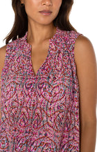 Load image into Gallery viewer, Make a statement in this beautiful paisley printed top with a blend of fuchsia, soft pink and a hint of blue. Its smocked neck adds a touch of elegance. Style it with trousers for a professional event or dress it up with denim and heels for a night out.
