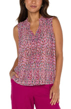 Load image into Gallery viewer, Make a statement in this beautiful paisley printed top with a blend of fuchsia, soft pink and a hint of blue. Its smocked neck adds a touch of elegance. Style it with trousers for a professional event or dress it up with denim and heels for a night out.