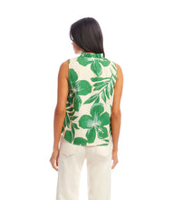 Load image into Gallery viewer, Woman wearing a sleeveless top with green and cream floral and leaf pattern on a white background.