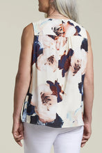 Load image into Gallery viewer, Add a touch of elegance to your summer look with our Twisted Front Sleeveless Blouse by Tribal. This chic blouse features a unique twisted front detail, creating a sophisticated silhouette that's perfect for warm weather. The sleeveless design ensures you stay cool and comfortable, while the breezy summer print adds a stylish flair.