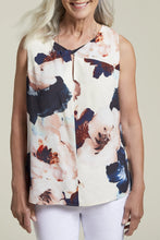 Load image into Gallery viewer, Add a touch of elegance to your summer look with our Twisted Front Sleeveless Blouse by Tribal. This chic blouse features a unique twisted front detail, creating a sophisticated silhouette that's perfect for warm weather. The sleeveless design ensures you stay cool and comfortable, while the breezy summer print adds a stylish flair.