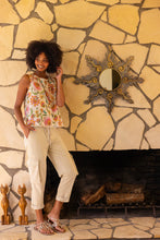 Load image into Gallery viewer, Enhance your wardrobe with this stunning sleeveless floral blouse featuring a buttoned back and a frayed hemline. It's the epitome of sophistication and pairs seamlessly with trousers or jeans for a chic, effortless style.