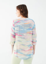 Load image into Gallery viewer, This stylish and comfortable shirt features a multicolor abstract print that adds a pop of color to any outfit. With its split V-neck design and darling three-quarter sleeves with ruffled cuffs, this shirt combines modern fashion with timeless elegance. Whether you're pairing it with jeans for a casual look or dress pants for a more polished ensemble, the Starla is a versatile addition to your collection.