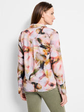 Load image into Gallery viewer, This multifunctional shirt serves as a must-have in any wardrobe, effortlessly providing comfort and style with its striking yet refined abstract floral pattern. The specially crafted Cotton Lawn fabric allows for breathable wear all day, along with the added artistic touch of the digital print. Whether heading to work, meeting up with friends, or attending a special event, the Smoky Petals Shirt is a chic and reliable choice that exudes confidence and sophistication.