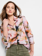 Load image into Gallery viewer, This multifunctional shirt serves as a must-have in any wardrobe, effortlessly providing comfort and style with its striking yet refined abstract floral pattern. The specially crafted Cotton Lawn fabric allows for breathable wear all day, along with the added artistic touch of the digital print. Whether heading to work, meeting up with friends, or attending a special event, the Smoky Petals Shirt is a chic and reliable choice that exudes confidence and sophistication.