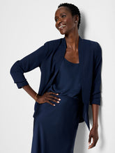 Load image into Gallery viewer, Elevate your look in an instant with the Social Edit Blazer. This versatile piece is designed to pair perfectly with your favorite cami, offering a sleek, polished look that transitions seamlessly from day to night. The sleeves can be worn rolled or unrolled for effortless style, and the fabric has a silky, drapey feel, providing luxurious comfort. It's also made from partially recycled materials, making it an eco-conscious style.