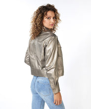 Load image into Gallery viewer, Our "Jacket PU" made of Polyurethane fabrication provides a stylish and edgy look. This faux leather jacket is of high quality and adds an eye-catching and bold touch to your outfit. Add a modern touch to your wardrobe with this shiny soft gold jacket, perfect for achieving an effortlessly cool look.