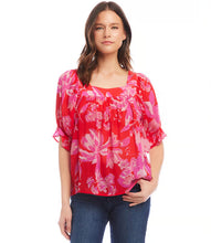 Load image into Gallery viewer, This square neck top is made from soft viscose fabric and features a delicate floral pattern that adds a touch of romance to your ensemble. It is suitable for both casual and special occasions, with short ruffled sleeves adding a playful and feminine touch. The fabric's softness also creates a pleasant movement with every step taken.