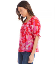 Load image into Gallery viewer, This square neck top is made from soft viscose fabric and features a delicate floral pattern that adds a touch of romance to your ensemble. It is suitable for both casual and special occasions, with short ruffled sleeves adding a playful and feminine touch. The fabric's softness also creates a pleasant movement with every step taken.