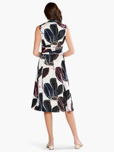 Load image into Gallery viewer, A classic and timeless design, our Sydney dress expertly combines black, white, and just the right amount of color in an oversized floral print. The silhouette is sleeveless and designed to fall below the knee. With pockets, a subtle collar, a sash at the waist this gorgeous dress is designed to flatter. Colors-White, black, blue, pink, beige. Woven dress. Shirt dress. Button front. Shirt collar. Sleeveless. Falls below knee.