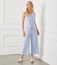 Load image into Gallery viewer, The Stripe Cropped Pants by Karen Kane offer a contemporary and polished aesthetic, perfect for effortless styling. Designed with wide legs and a cropped length, these pants feature striking blue and cream stripes for a bold yet sophisticated look. The high-rise waist provides a flattering fit, while the contrast stripe pockets add a stylish touch.