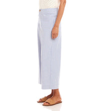 Load image into Gallery viewer, The Stripe Cropped Pants by Karen Kane offer a contemporary and polished aesthetic, perfect for effortless styling. Designed with wide legs and a cropped length, these pants feature striking blue and cream stripes for a bold yet sophisticated look. The high-rise waist provides a flattering fit, while the contrast stripe pockets add a stylish touch.