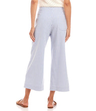 Load image into Gallery viewer, The Stripe Cropped Pants by Karen Kane offer a contemporary and polished aesthetic, perfect for effortless styling. Designed with wide legs and a cropped length, these pants feature striking blue and cream stripes for a bold yet sophisticated look. The high-rise waist provides a flattering fit, while the contrast stripe pockets add a stylish touch.