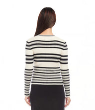 Load image into Gallery viewer, Elevate your style with our Stripe Ribbed Sweater. Made from a light fabric featuring a chic striped pattern, this sweater radiates sophistication and class. Its versatility allows for layering or wearing solo as an eye-catching item. Additionally, it offers supreme softness and comfort.