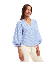 Load image into Gallery viewer, Woman wearing a blue and white striped blouse against a white background.