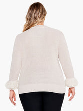 Load image into Gallery viewer, Bring a twist to your classic sweater with this statement-making fringe detail. The body has been knitted with a shaker stitch for a soft and comfortable feel. The pleats at the shoulder result in an effortless, feminine shape. This stunning style falls at the hips with ease. Color- Canva. Pullover sweater. Pleated sleeve with fringe cuff. Midweight. Regular fit. Crewneck. Bracelet sleeve.