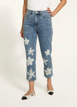 Load image into Gallery viewer, Step up your denim game with these chic Suzanne Pencil Crop Jeans! Featuring a flattering straight-leg fit and a trendy 7/8 length, these jeans are anything but ordinary. The delicate white floral embroidery and organza details add a fun and feminine touch, while the soft, stretchy fabric keeps you comfy all day long. Whether you're running errands or heading out for a casual lunch, these jeans are your go-to for effortless style.