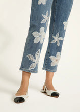 Load image into Gallery viewer, Step up your denim game with these chic Suzanne Pencil Crop Jeans! Featuring a flattering straight-leg fit and a trendy 7/8 length, these jeans are anything but ordinary. The delicate white floral embroidery and organza details add a fun and feminine touch, while the soft, stretchy fabric keeps you comfy all day long. Whether you're running errands or heading out for a casual lunch, these jeans are your go-to for effortless style.