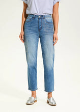 Load image into Gallery viewer, These eye-catching jeans in a medium wash, feature rhinestone embellishments on each leg, adding a touch of sparkle and elegance to the classic design. With a high-rise waist and a straight-leg shape, they offer a flattering fit and timeless style. The ankle length makes them perfect for pairing with heels or flats.