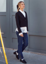 Load image into Gallery viewer, Enhance your wardrobe with our stunning jeans, featuring chic side slits highlighted by sparkling rhinestone embellishments. Crafted with functional pockets and a zipper closure, they provide both fashion and practicality.