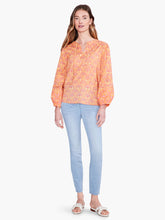 Load image into Gallery viewer, This bright and festive shirt takes your next casual look in an all-new direction. Tie the front to make a keyhole opening or leave it open. The design includes bracelet cuffs and flowy bishop sleeves. Sits just below the waist in an easy fitting silhouette. Color-Orange multi. Easy fit. Round neck. Bracelet sleeve. Bishop sleeve.