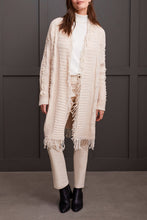 Load image into Gallery viewer, Envelop yourself in elegance with the Senara Sweater Cardigan. This cozy knitted cardigan boasts distinctive descending pearl embellishments along the sleeves and a frilled collar, making it an ideal addition to elevate any outfit.
