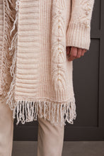 Load image into Gallery viewer, Envelop yourself in elegance with the Senara Sweater Cardigan. This cozy knitted cardigan boasts distinctive descending pearl embellishments along the sleeves and a frilled collar, making it an ideal addition to elevate any outfit.