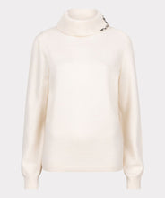 Load image into Gallery viewer, Elevate your wardrobe with the EsQualo Embellished Gem Collar Sweater. This stunning piece features a split turtleneck adorned with gem embellishments on both sides of the split collar, adding a touch of elegance and sophistication to your look. The sweater is designed with long sleeves, two floral gems on each cuff and a comfortable fit, making it perfect for both casual and dressy occasions.