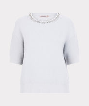 Load image into Gallery viewer, Off-white short sleeve sweater with embellished neckline against a white background.