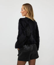 Load image into Gallery viewer, Wrap yourself in warmth and style, with our Henrika Hair Sequins Sweater in an eye-catching fuzzy checkered design. A fashion-must have, our EsQualo sweater is made of fluffy warm hairy fabrication set off with tiny, sparkle sequins. The Henrika is perfect for everything from daily routines to holiday attire, offering a luxurious feel in its cozy, warm embrace.