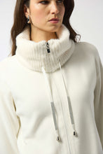 Load image into Gallery viewer, Woman wearing a Winter white zip-up coat with a fur-lined collar and cuffs with rhinestone drawstrings against a white background.