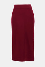 Load image into Gallery viewer, Merlot knit midi skirt against a white background.