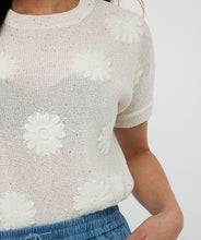Load image into Gallery viewer, The EsQualo Senia Sweater is a chic, feminine knit featuring delicate floral appliqué and tiny sparkling sequins, a classic round neckline, and short sleeves for effortless style. Crafted from 60% acrylic and 40% polyester, it offers a soft, comfortable fit perfect for layering or wearing solo. this sweater blends elegance and versatility, making it a must-have wardrobe essential.