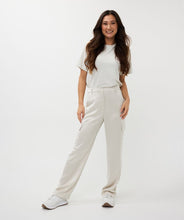 Load image into Gallery viewer, Elevate your wardrobe and sparkle with our Samia Short Sleeve Wide Fit Lurex T-Shirt, designed for women who value comfort and style. Made with a shimmering lurex fabric blend, this versatile top is a must-have for casual outings or dressed-up evenings. This t-shirt offers a flattering fit and just the right amount of shimmer.
Perfect as a spring fashion essential, pair this sparkling t-shirt with your favorite jeans or skirts for an effortlessly chic look and wear under a favorite blazer or cardigan.