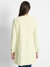 Load image into Gallery viewer, This eye-catching tunic-length jacket is the perfect addition to any outfit, whether paired with jeans or dressed up for a more elevated look. The interknit of pistachio and cream colors adds a vibrant touch, while the functional buttons add a touch of sophistication. The signature texture of the knit adds subtle contrast and depth to the overall appearance. It also features convenient pockets for added functionality.