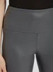 Load image into Gallery viewer, These Vegan Leather leggings are made from stretchy Textured Faux Leather, boasting a body hugging fit and a concealed signature waistband that offers a smooth, flattering silhouette. In a versatile charcoal color, they complement a wide array of your preferred tops beautifully.